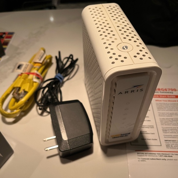 Arris surfboard model#sbg6700-ac. Cable modem & WiFi router.Box has been opened - Picture 2 of 6